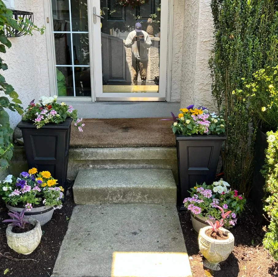 Local lawn mowing service with custom design in Upper Darby, PA by Pots and Planters