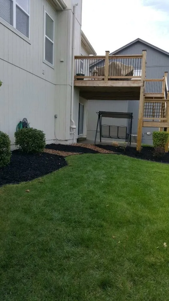 Trusted lawn mowing service for outdoor upgrades in Olathe, KS by Potter's Touch Landscaping