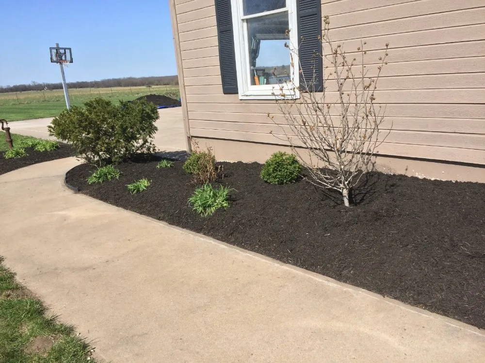Custom landscape installation in Olathe, KS - Potter's Touch Landscaping