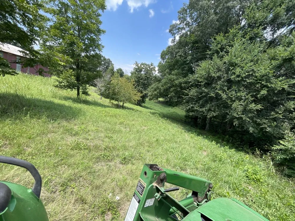 Custom landscape installation for year-round maintenance in Jonesboro, AR by Poynor Landscapes