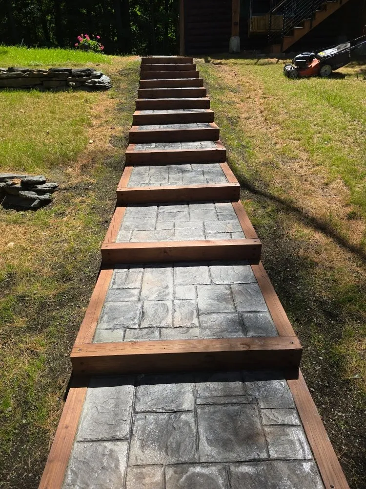 Expert lawn mowing service with custom design across Wells, VT - P&P Landscaping And Property Management