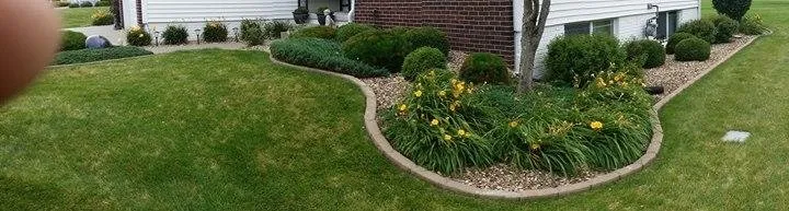 Expert landscape installation with custom design in Marion, IA by Prairie Winds Lawn & Landscaping