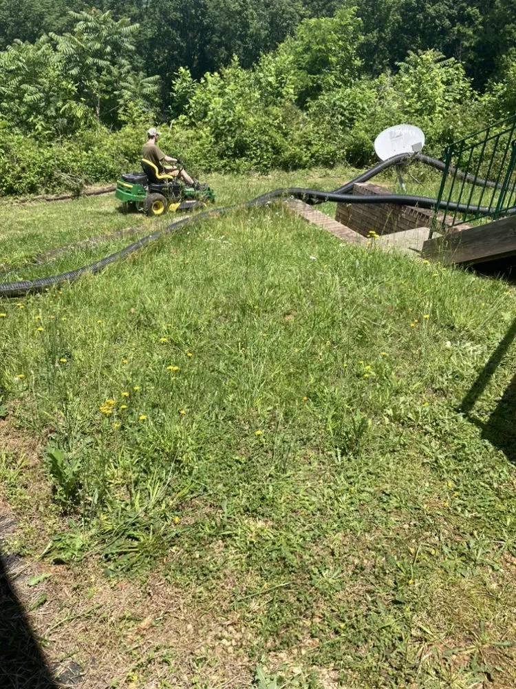 Professional lawn mowing service for residential properties in Lenoir, NC by Precious Mowing