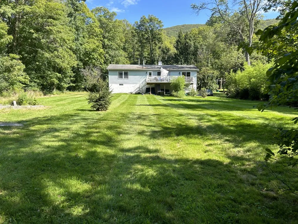 Custom landscape installation in Brewster, NY by Precise Landscaping