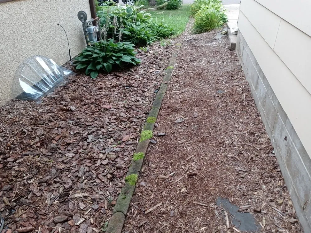 Custom residential landscaping for year-round maintenance across Blaine, MN - Precision Drainage & Landscape