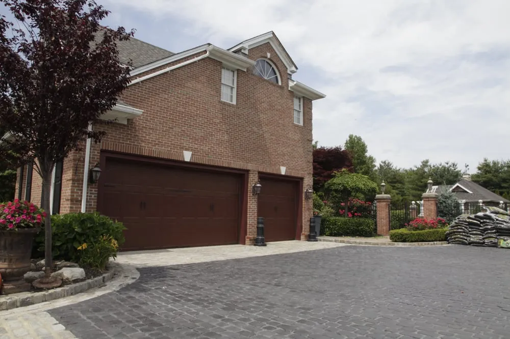 Professional yard cleanup service in Bohemia, NY by Precision Enterprises