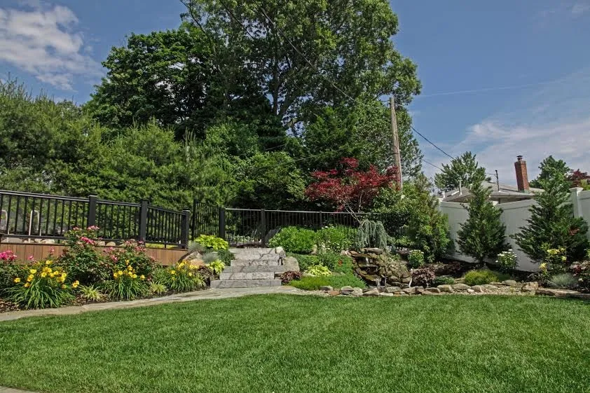 Trusted landscape installation for residential properties in Bohemia, NY by Precision Enterprises