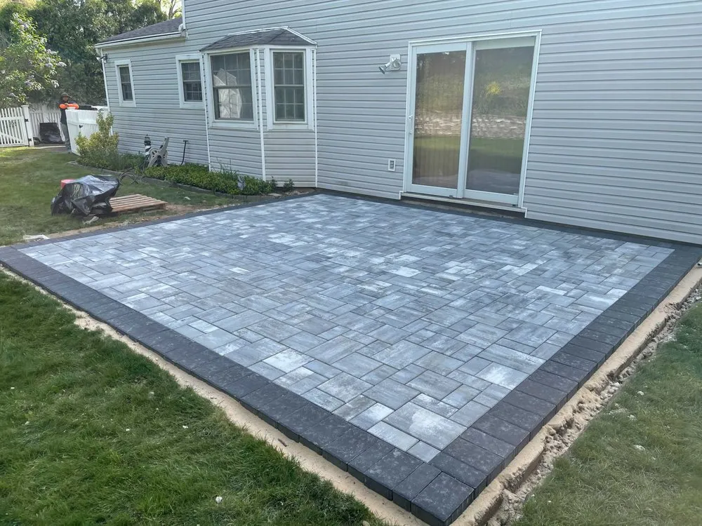 Affordable lawn care service near you across Bohemia, NY - Precision Enterprises