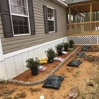 Professional lawn care service experts serving Shreveport, LA - Precision Flowerbed Designs