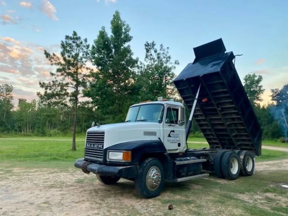 Expert lawn care service with custom design in Splendora, TX by Precision Grade & Blade