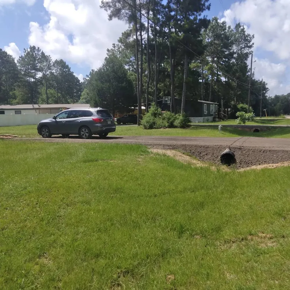 Trusted lawn mowing service with custom design in Splendora, TX by Precision Grade & Blade