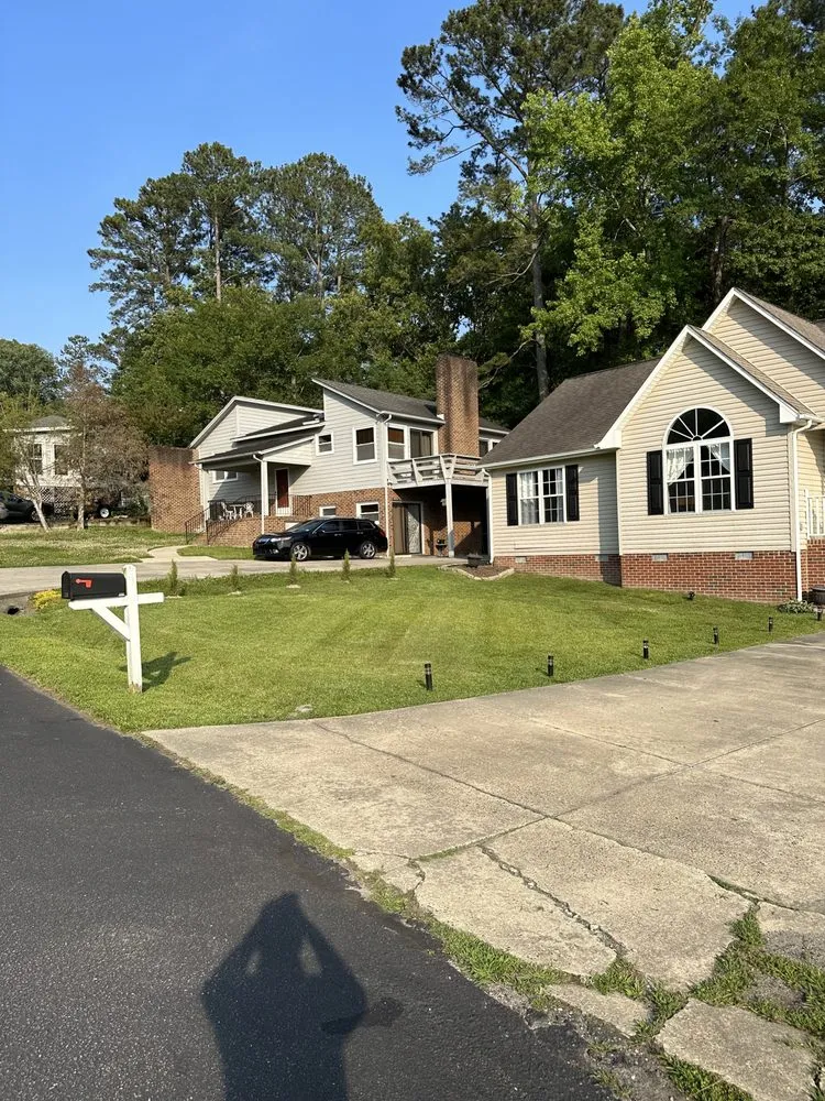 Custom landscape design for residential properties in Sanford, NC by Precision Landscapes