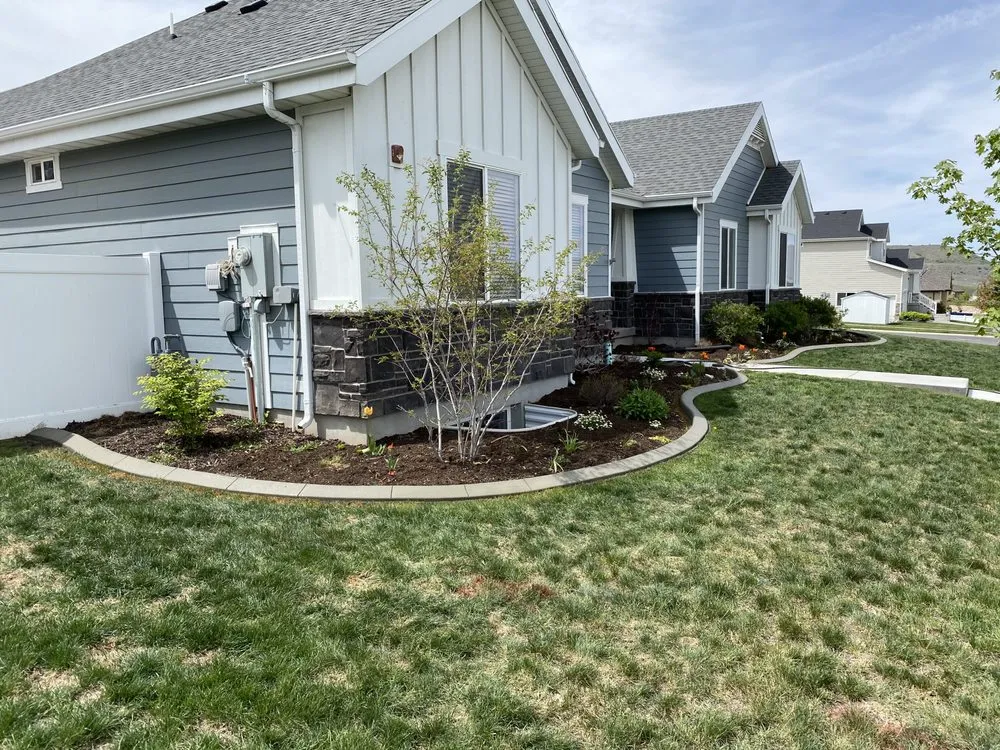 Local yard cleanup service for year-round maintenance in Payson, UT by Precision Landscaping & Concrete