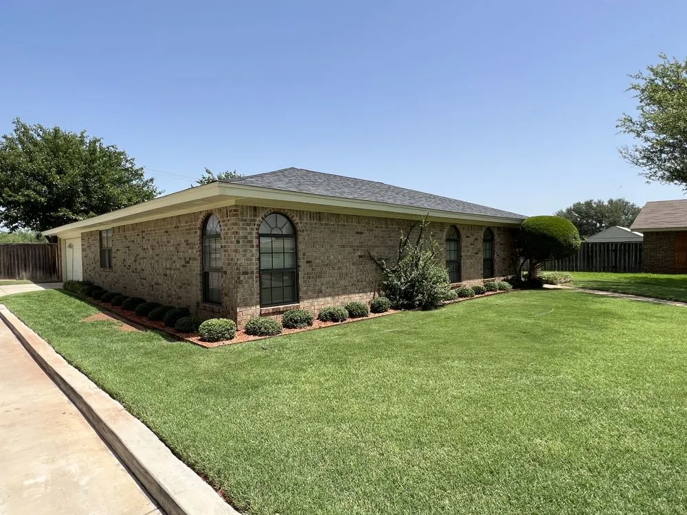 Custom outdoor landscaping for residential properties in Wichita Falls, TX by Precision Lawn & Tree