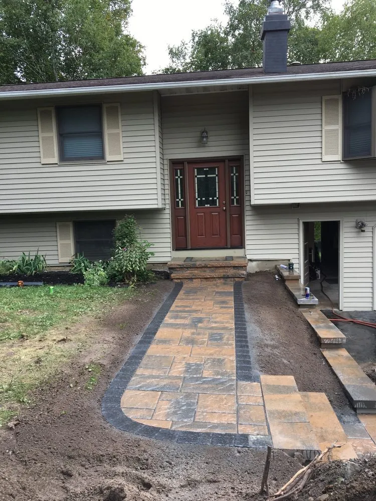 Expert lawn care service in Baldwinsville, NY by Precision Pavers