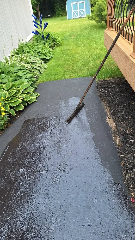 Professional landscape design for year-round maintenance in Waterford Township, MI by Precision Paving and Sealing