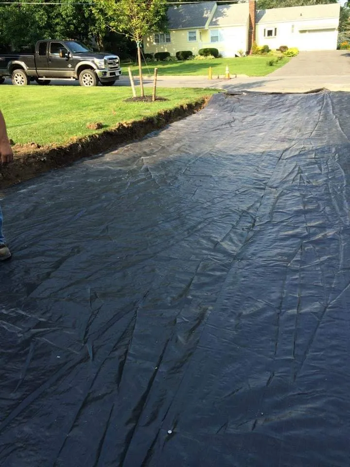 Custom landscape installation for homes in Old Lyme, CT by Precision Sealcoating & Landscaping