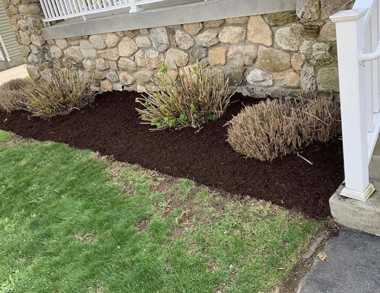 Custom garden landscaping for year-round maintenance in Wolcott, CT by Preferred Landscaping & Construction
