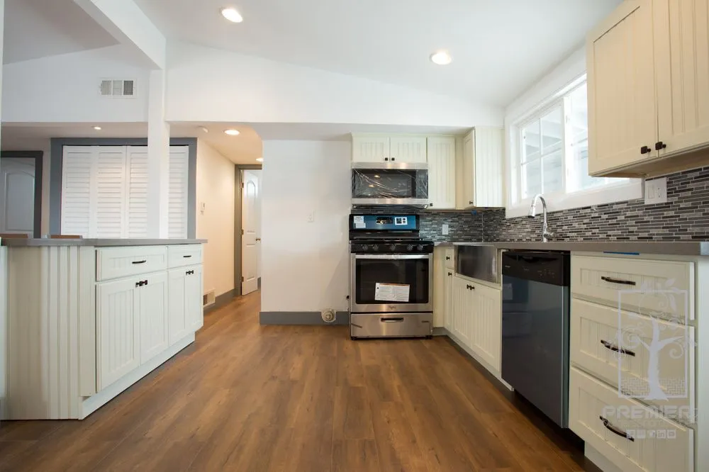 Custom garden landscaping with custom design in Fountain Valley, CA by Premier Builders and Hardscape