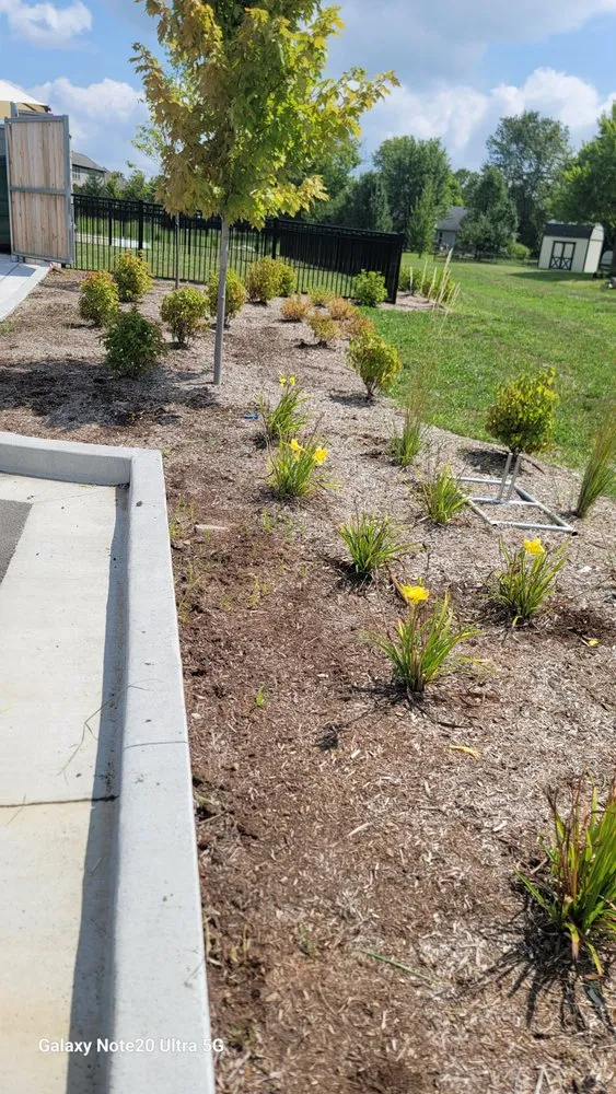 Custom residential landscaping for year-round maintenance in Indianapolis, IN by Premier Grounds Services