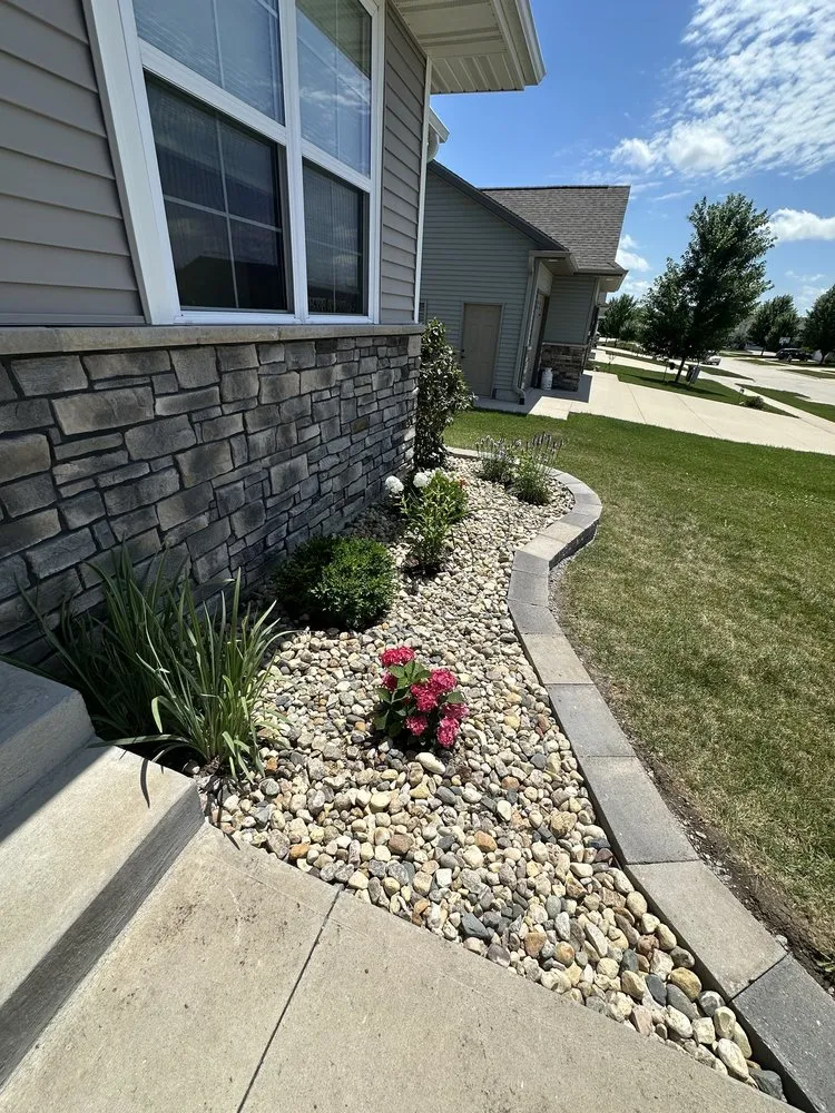 Custom outdoor landscaping for year-round maintenance in North Liberty, IA by Premier Home & Renovations
