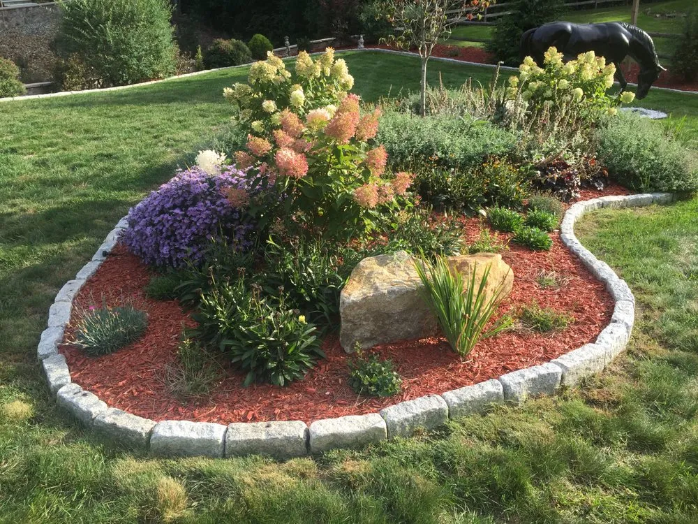 Affordable yard cleanup service in Stafford Springs, CT by Premier Landscaping