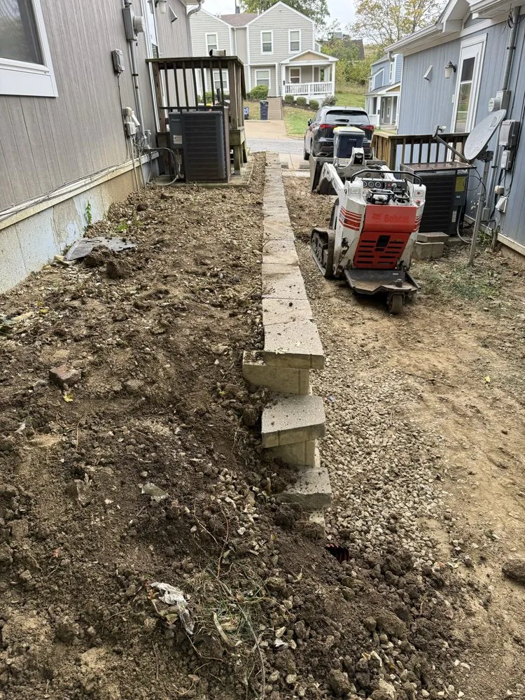 Custom landscape design for year-round maintenance in Holt, MO by Premier Lawn and Landscape