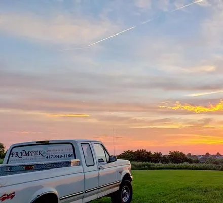Premier Mowing & Tree Service Logo
