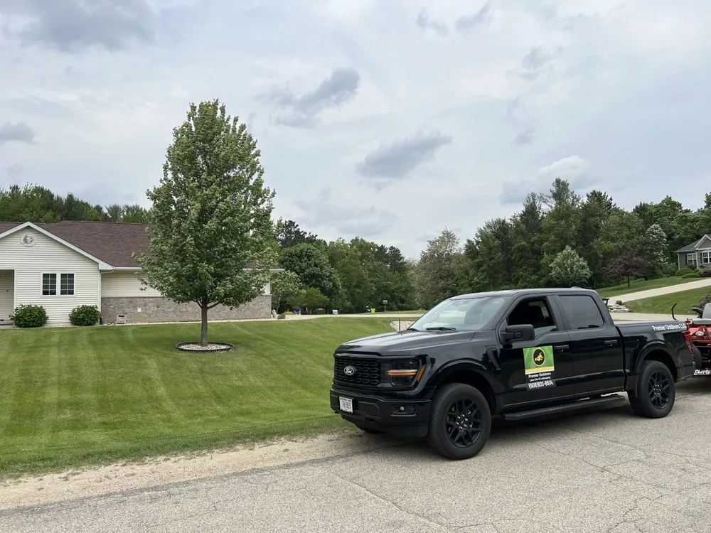 Professional lawn mowing service in Footville, WI by Premier Outdoors
