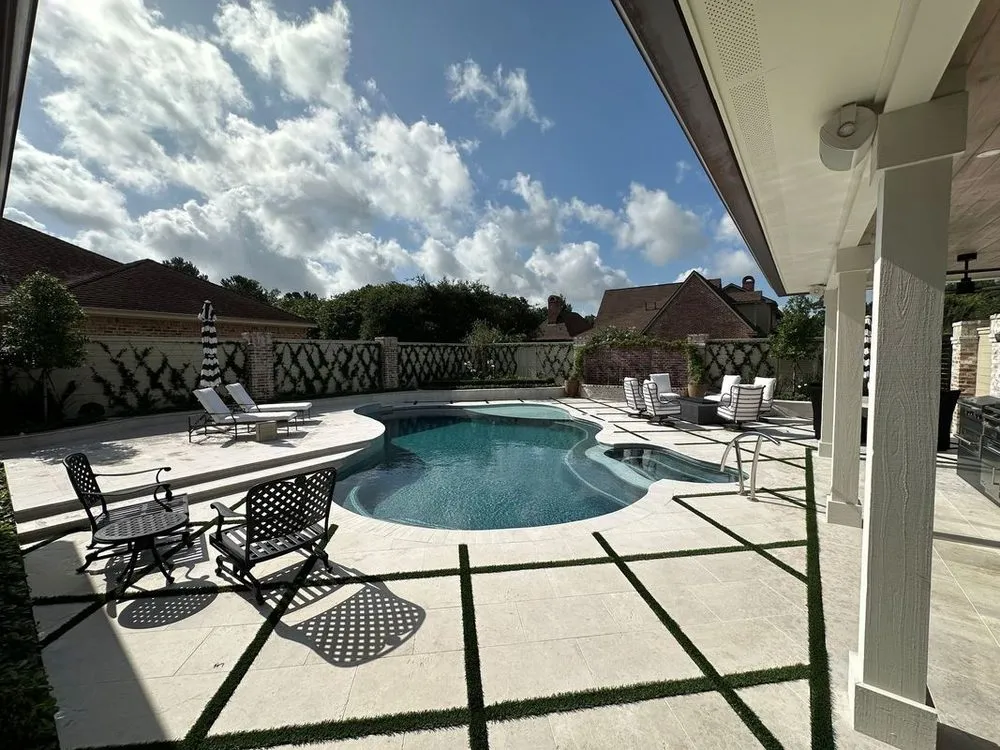 Custom landscape installation in Port Neches, TX by Premier Pools & Patios