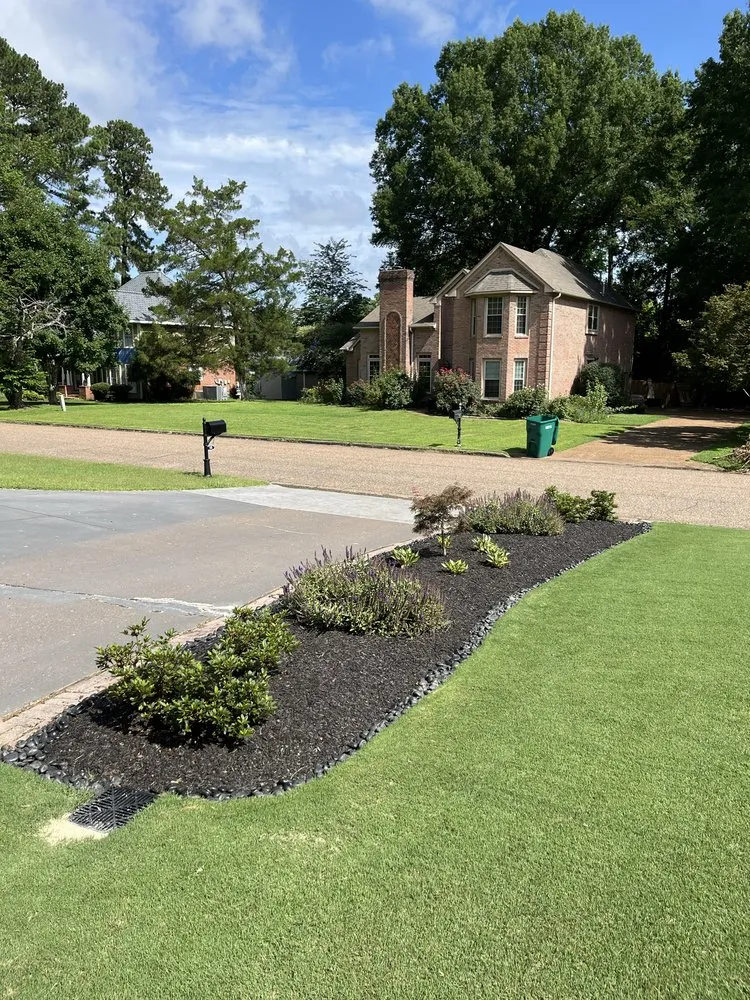 Custom landscape installation with custom design in Medina, TN by Premier Properties