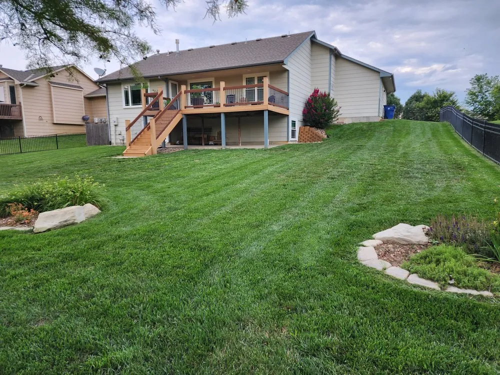 Custom lawn mowing service for homes in Edmond, OK by Premier Turf Management