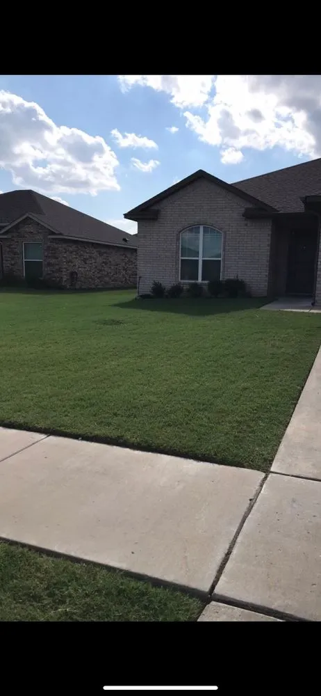 Custom lawn care service in Tulsa, OK by Premium Lawn Mowing