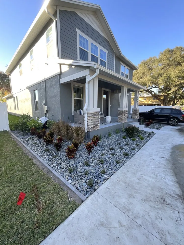 Custom lawn mowing service for outdoor upgrades in Tampa, FL by Premium Outdoor Living