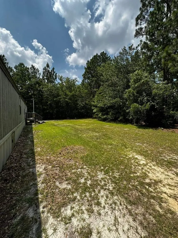 Affordable landscape design for homes in Pleasanton, TX by Prestige Cuts