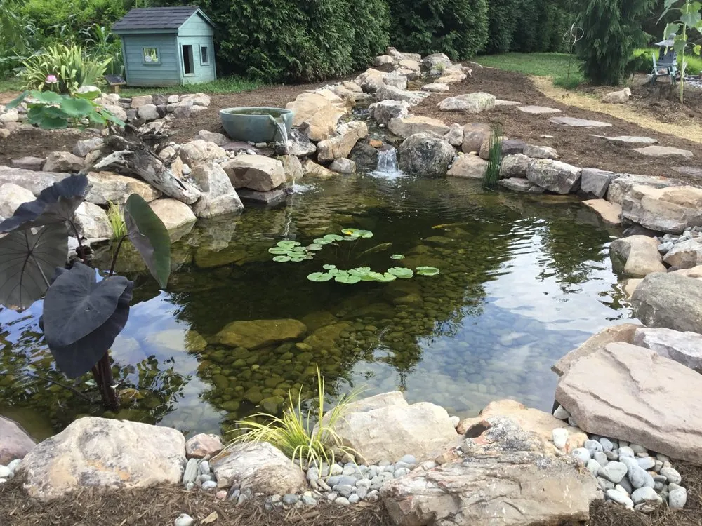 Local lawn mowing service for year-round maintenance in Warrenton, VA by Prestige Illumination & Ponds