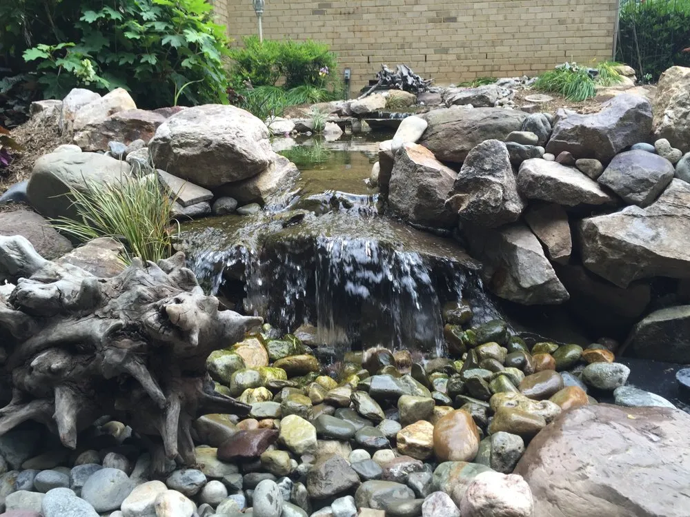 Custom lawn mowing service with custom design in Warrenton, VA by Prestige Illumination & Ponds