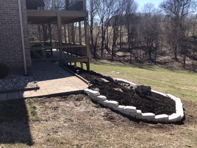 Custom landscape installation with custom design in Nixa, MO by Prestige Lawn & Landscape