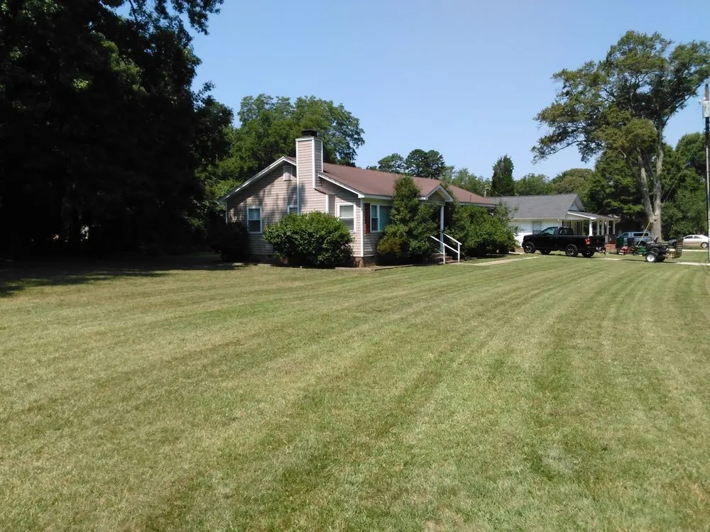 Custom lawn mowing service for residential properties in Concord, NC by Prestige Lawn Maintenance