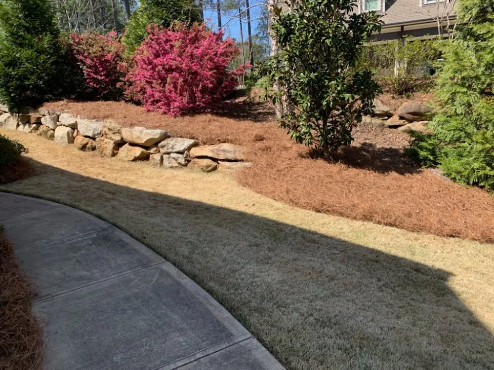 Professional landscape design in McIntyre, GA by Prestige Pinestraw & Outdoor Solutions