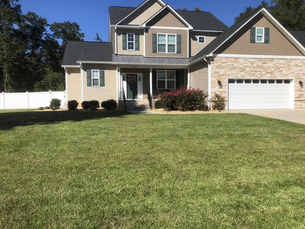 Affordable outdoor landscaping for homes in Fayetteville, NC by Pretty City Lawns