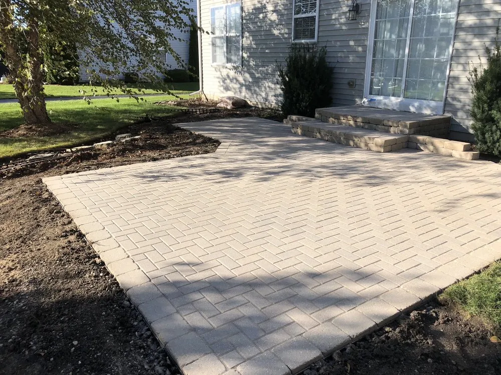 Reliable yard maintenance for beautiful yards across Harvard, IL - Pretty Stone Landscaping and Design