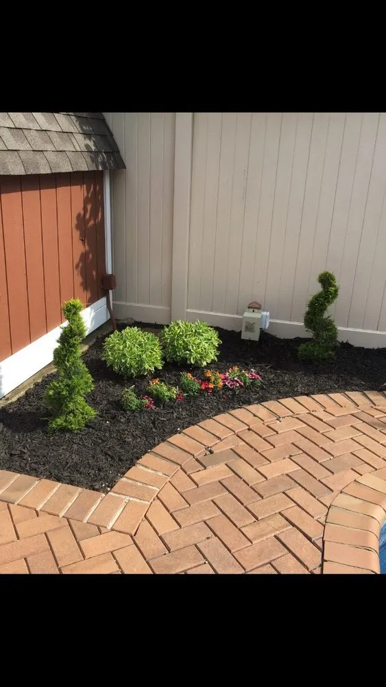 Professional landscape installation in Dix Hills, NY by Prianti Farms, Inc.