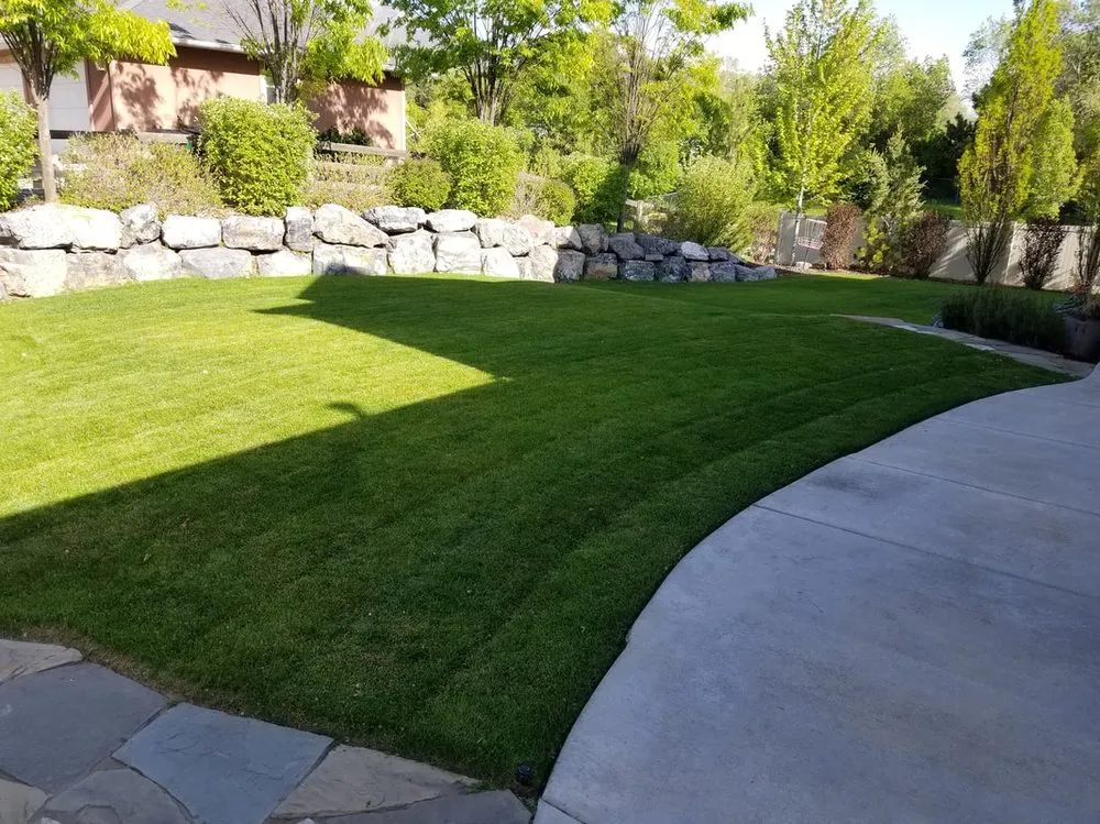Local landscape installation for year-round maintenance in Kaysville, UT by Priced Right Lawn Care
