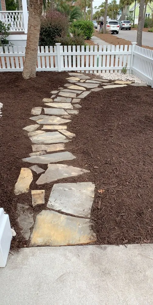 Trusted landscaping services with custom design in Southport, NC by Pride Landscape Maintenance