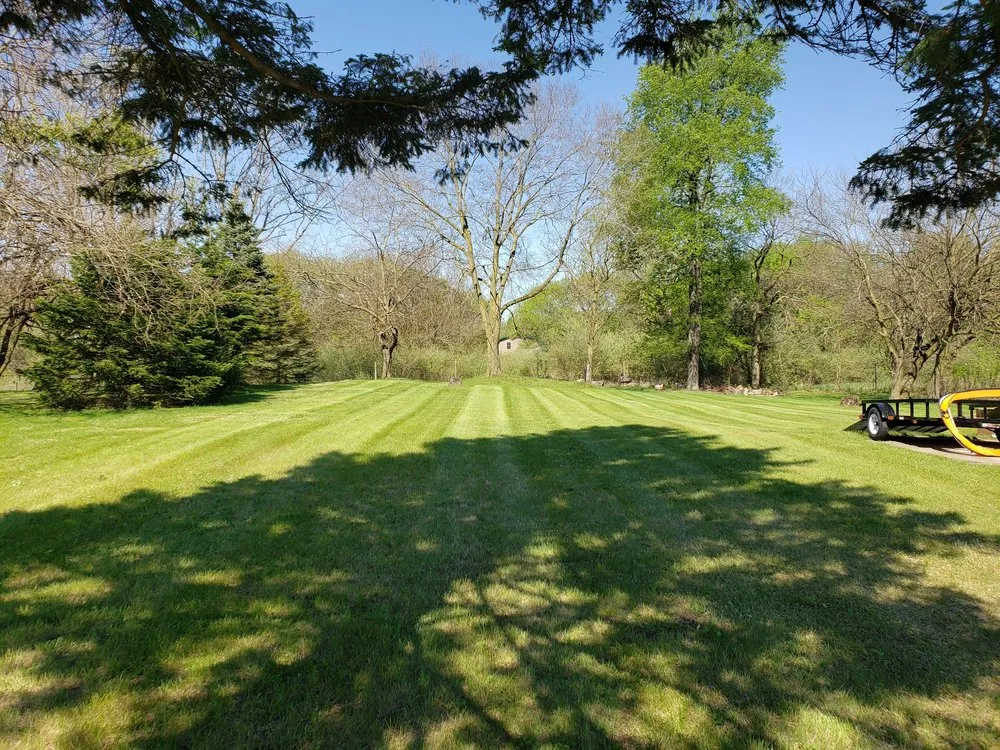Custom landscape installation with custom design in Montrose, MI by Pride Lawn Care