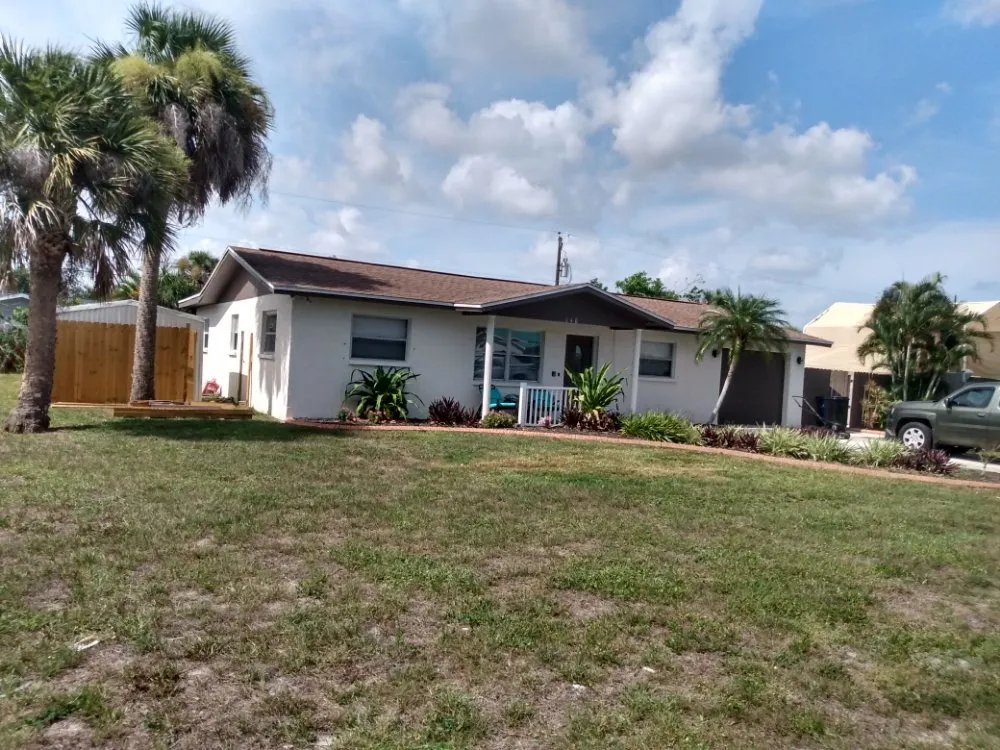 Affordable lawn mowing service for residential properties across Venice, FL - Pride Window & Construction Cleaning