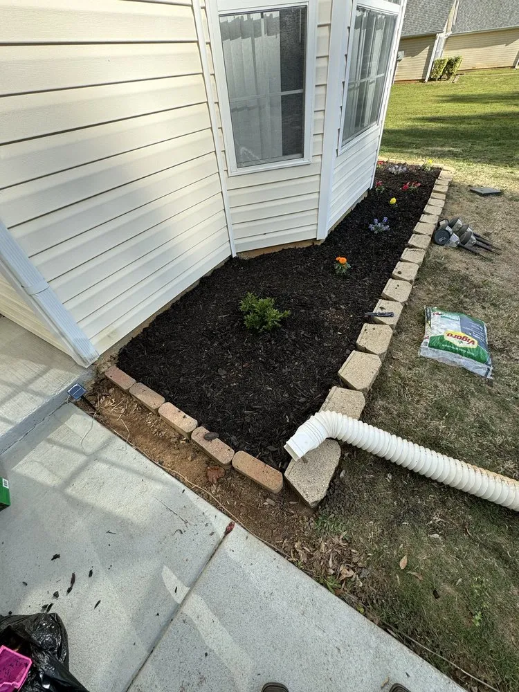 Affordable landscape installation with custom design in Jefferson, GA by PrimeTrimScapes Landscaping