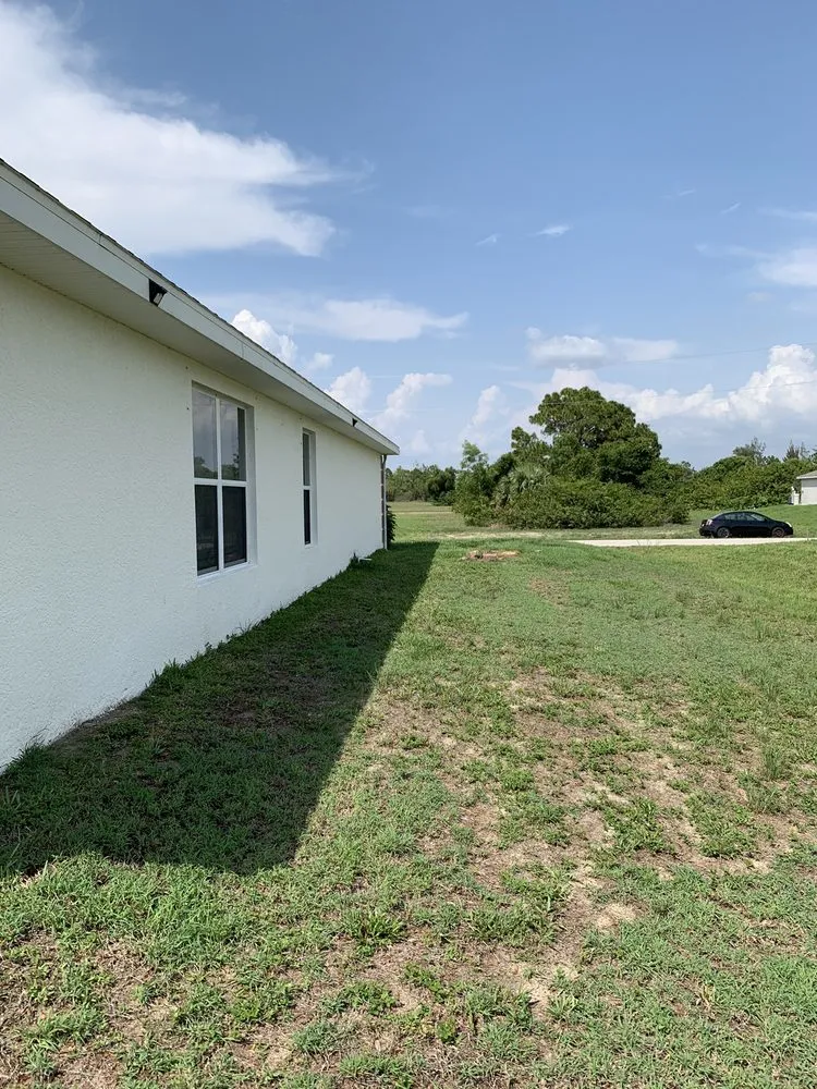 Custom yard cleanup service in Cape Coral, FL by Priority Lawn Care & Tree Service