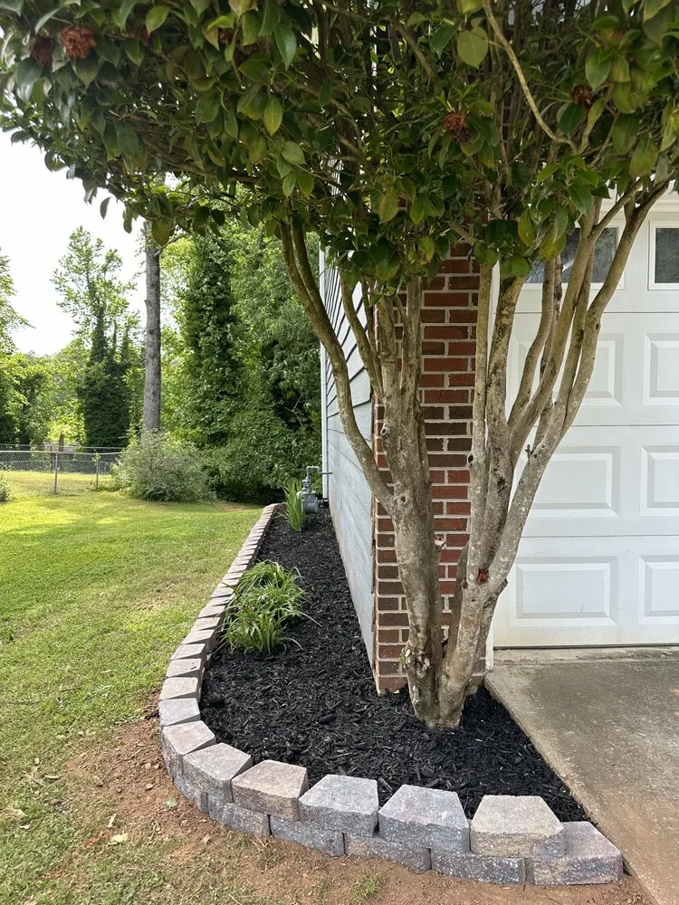 Custom lawn care service with custom design across Carrollton, GA - Pristine Gardens